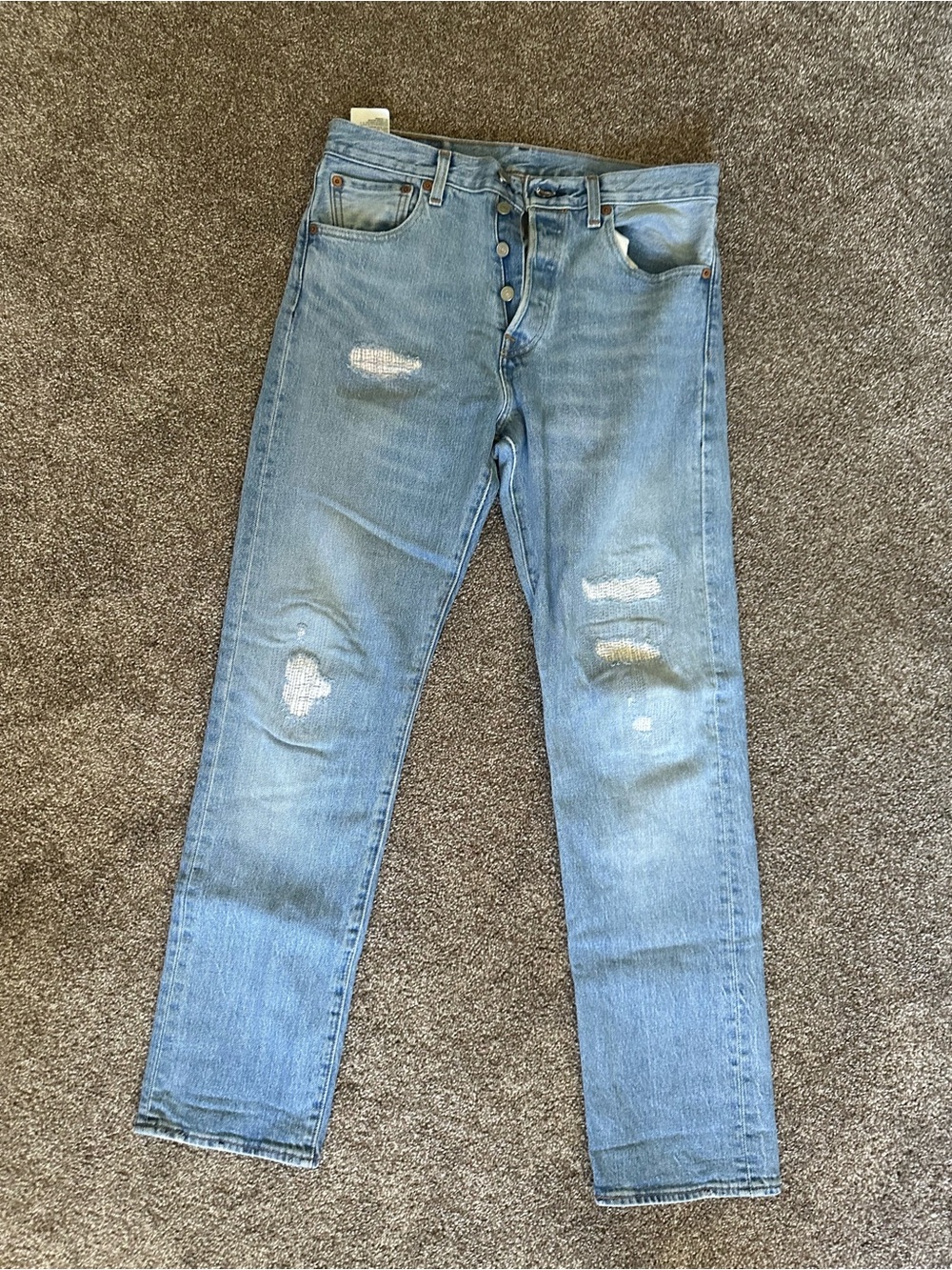 Levi's Women's Light Blue Straight Leg Distressed Jeans